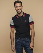 Polo manga corta con cuello a rayas y mangas en bloques de color para hombre - Negro