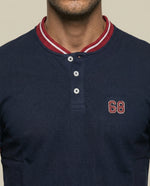 Polo manga corta cuello bomber con ribetes a rayas - Azul