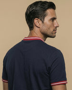Polo manga corta cuello bomber con ribetes a rayas - Azul