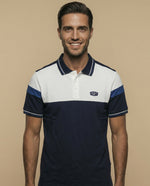 Polo manga corta con diseño de bloques y ribetes a rayas - Azul