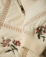 Chaqueta bomber bordada con diseño floral - Crudo
