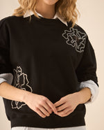 Buzo con lentejuelas para mujer - Negro